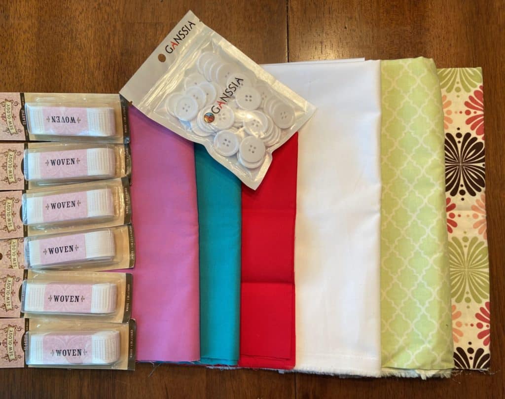 Folded fabric with small bag of buttons