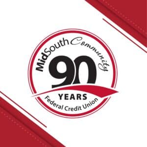 Logo for MidSouth Community Federal Credit Union&rsquo;s 90th anniversary featuring 90 Years in bold black text inside a red and white circular design with decorative red banners and corner accents.